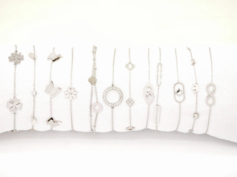 Lot de 12 bracelets en acier inoxydable avec coussin - ARGENT