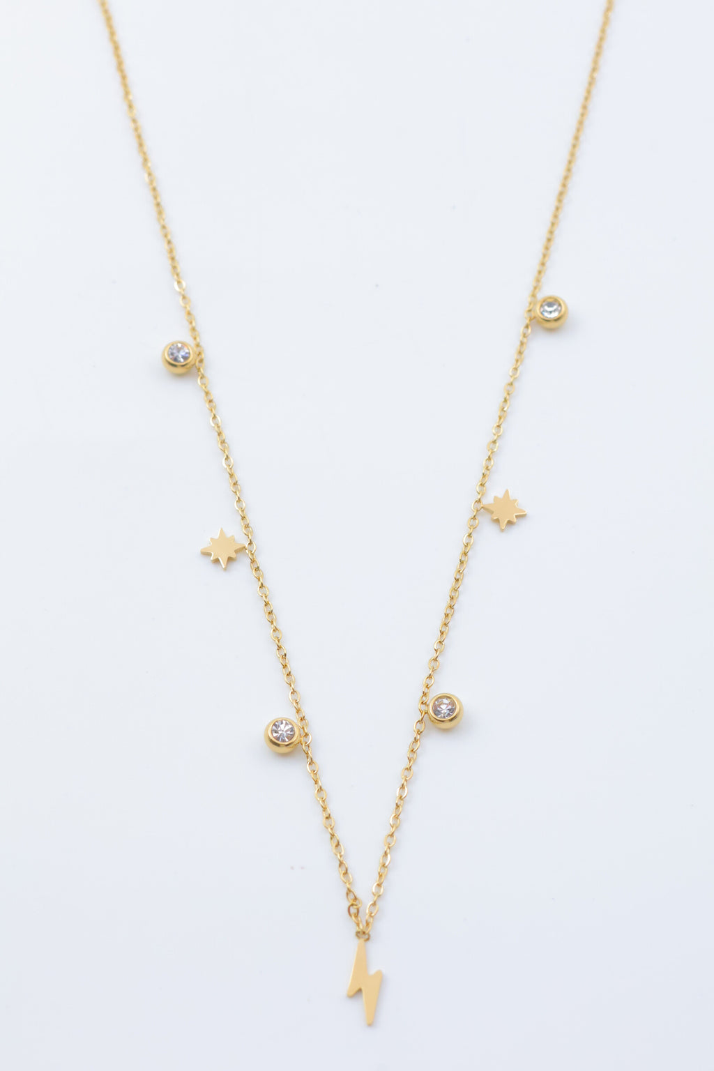 Collier chaîne avec pendentifs éclair et étoiles - DORÉ