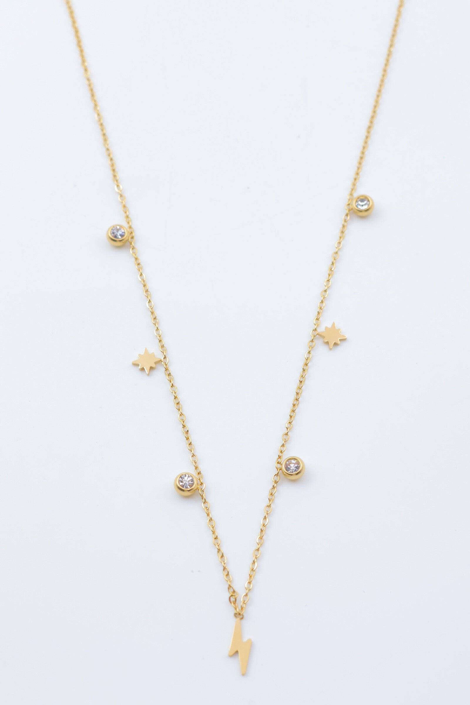 Collier chaîne avec pendentifs éclair et étoiles - DORÉ