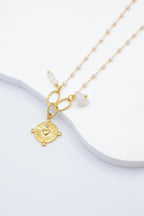 Collier avec pendentif rond et motifs cœur - BLANC