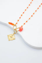 Collier avec pendentif rond et motifs cœur - ORANGE