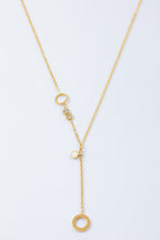 Collier avec éléments circulaires et cristaux - DORÉ