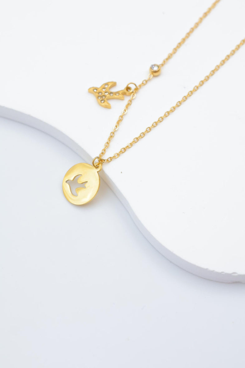 Collier avec pendentif oiseau - DORÉ