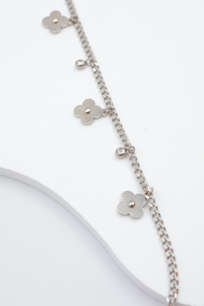 Bracelet avec motifs floraux et éléments circulaires intégrant des cristaux. - ARGENT