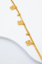 Bracelet avec motifs floraux et éléments circulaires intégrant des cristaux. - DORÉ