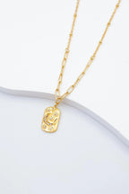 Collier avec pendentif lotus et poisson - DORÉ