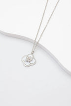 Collier avec motif fleur et étoile - ARGENT