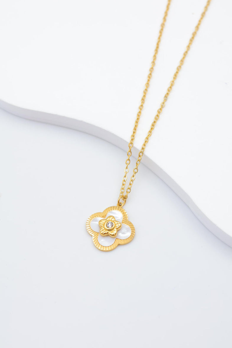 Collier avec motif fleur et étoile - DORÉ