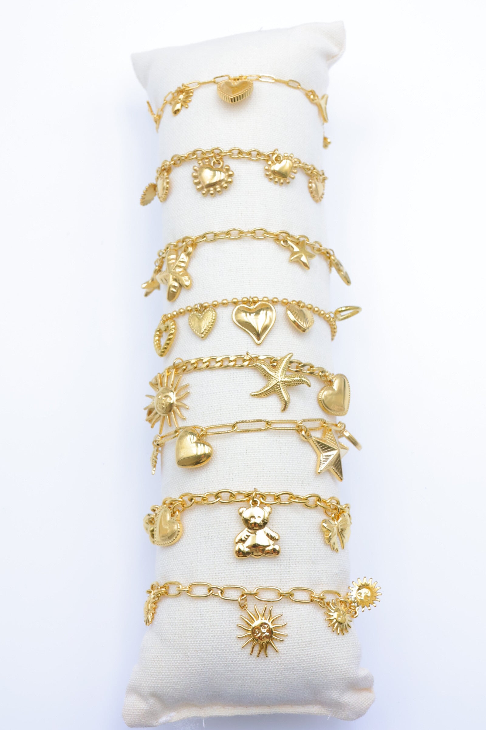 Lot de 8 bracelets en acier inoxydable avec coussin - DORÉ