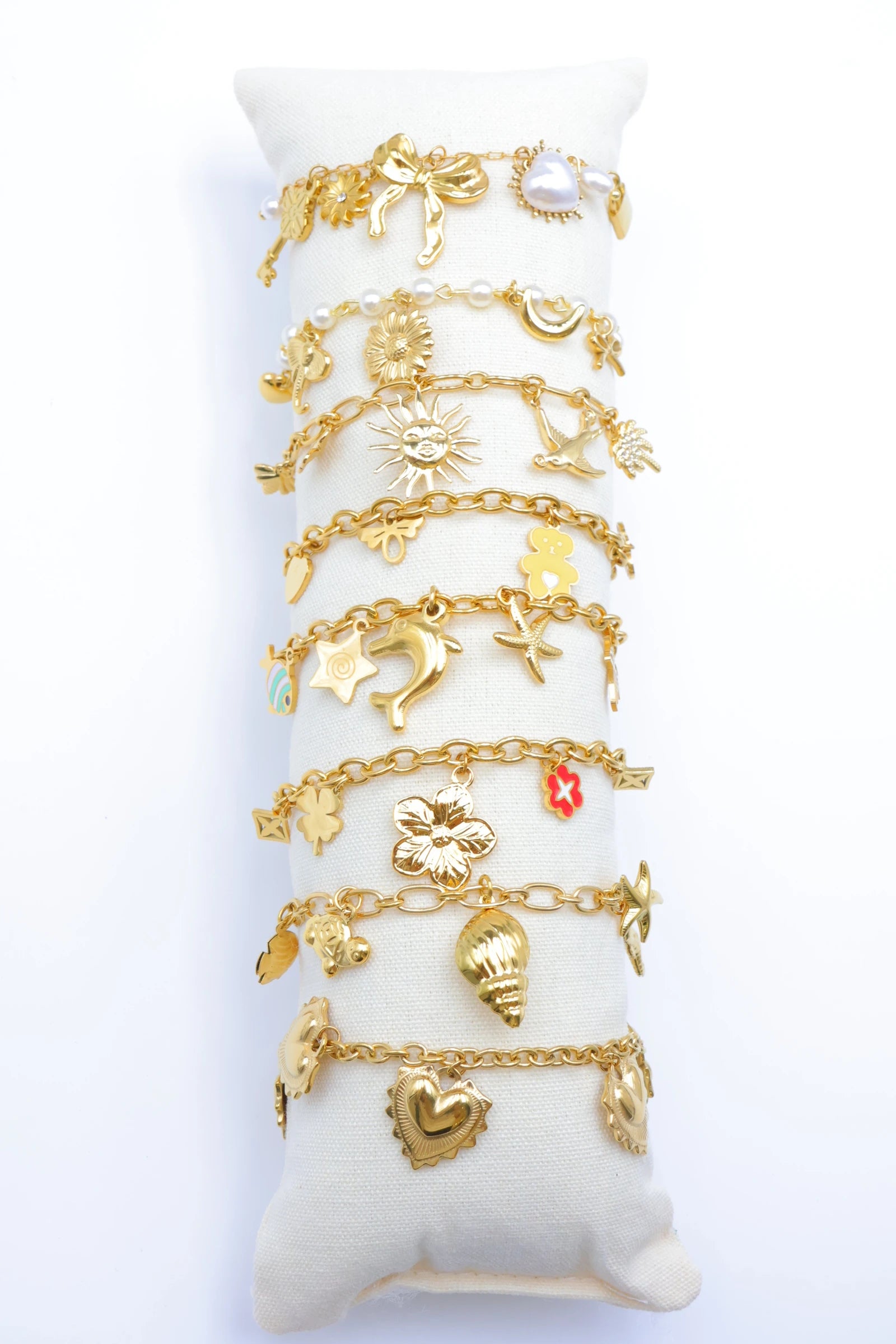 Lot de 8 bracelets en acier inoxydable avec coussin - DORÉ