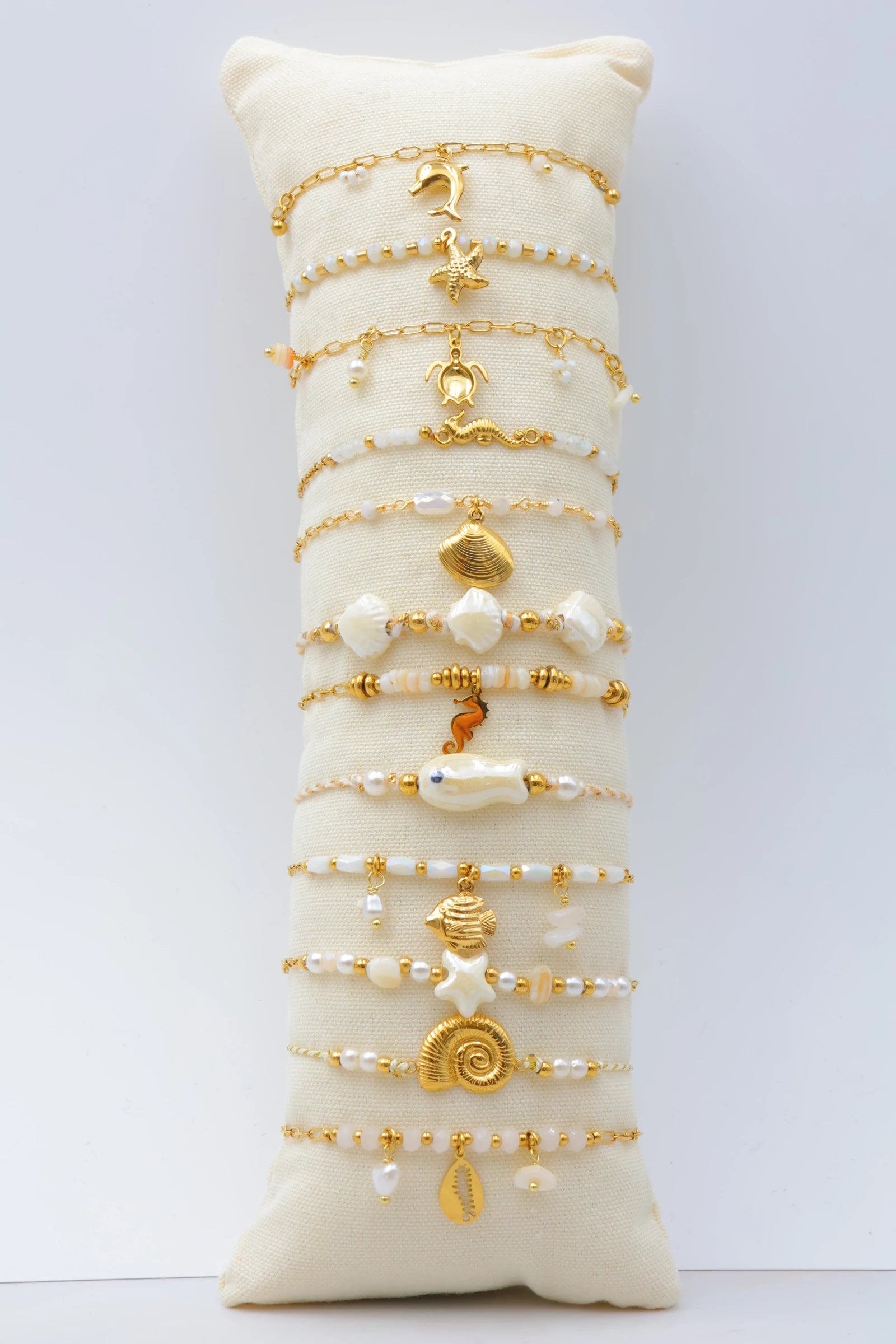 Lot de 12 bracelets en acier inoxydable avec coussin - BLANC