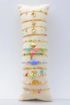 Lot de 12 bracelets en acier inoxydable avec coussin - MULTICOLORE