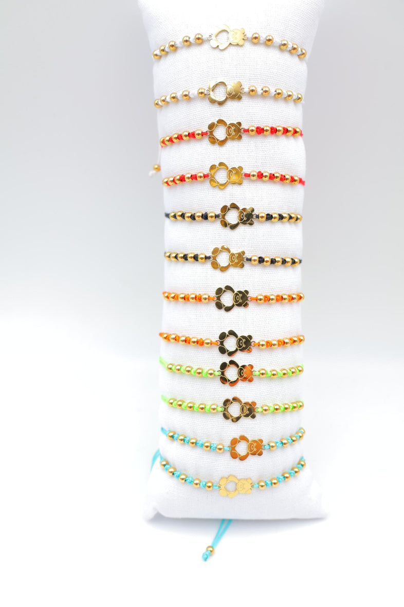 Lot de 12 bracelets en acier inoxydable avec coussin - MULTICOLORE