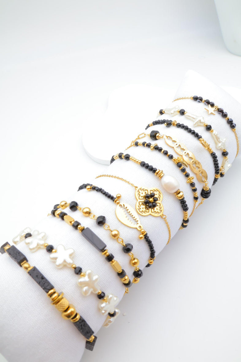 Lot de 12 bracelets en acier inoxydable avec coussin - NOIR