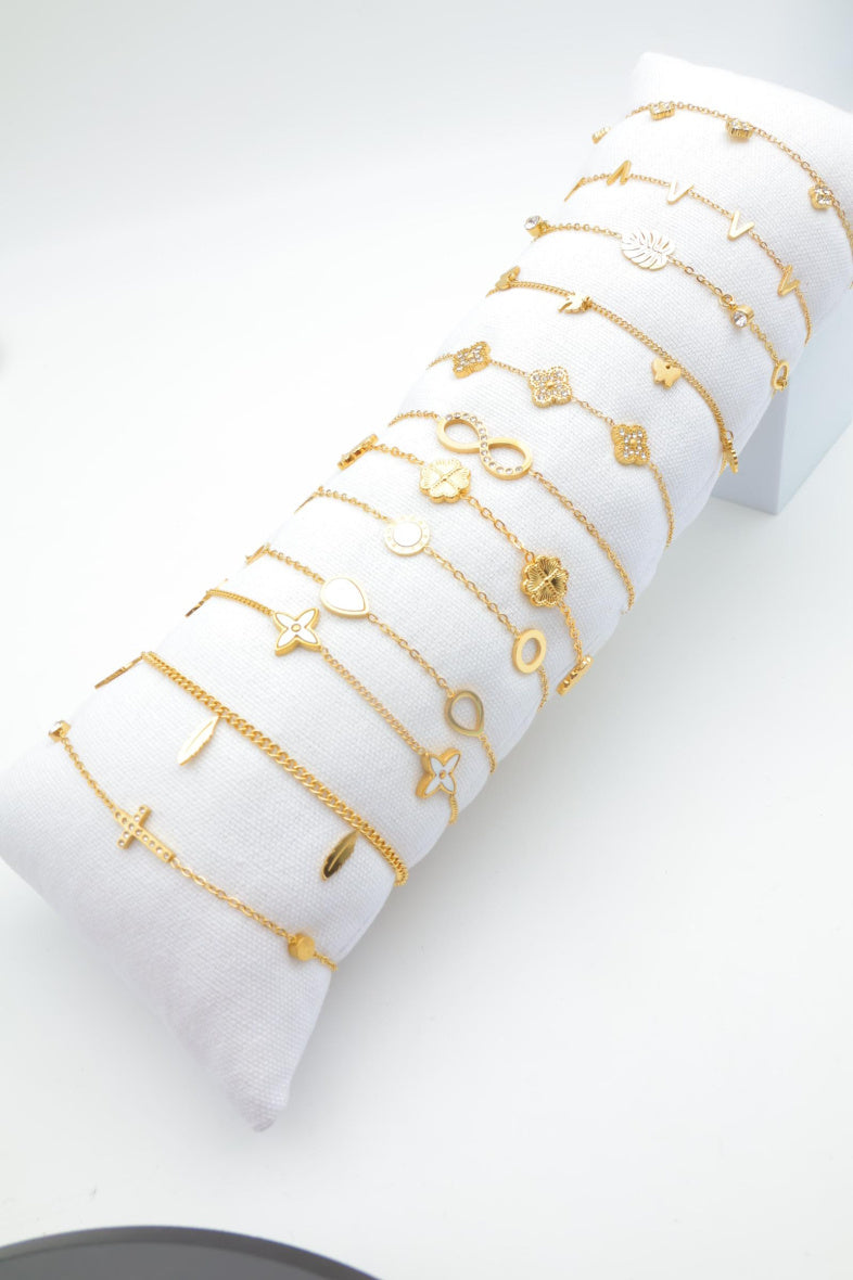 Lot de 12 bracelets en acier inoxydable avec coussin - DORÉ