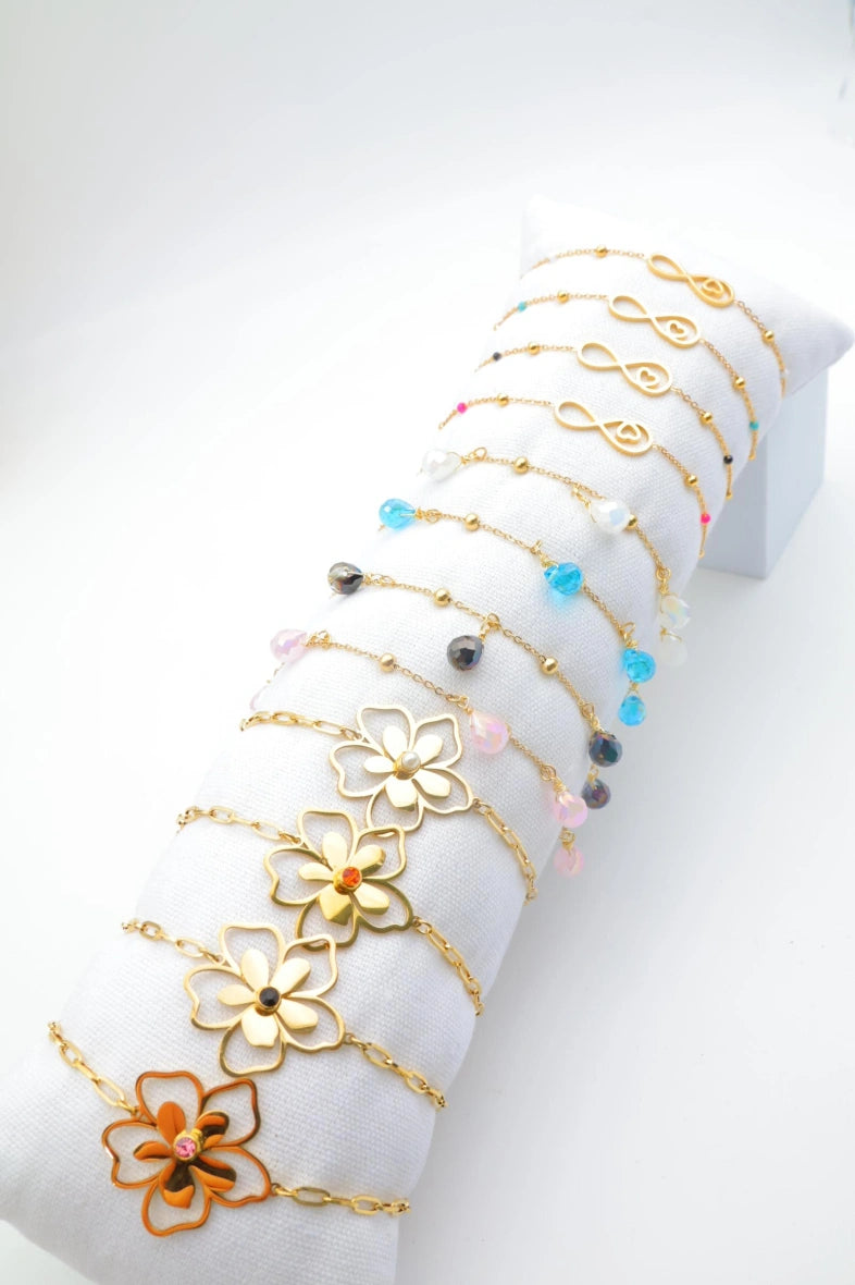 Lot de 12 bracelets en acier inoxydable avec coussin - MULTICOLORE