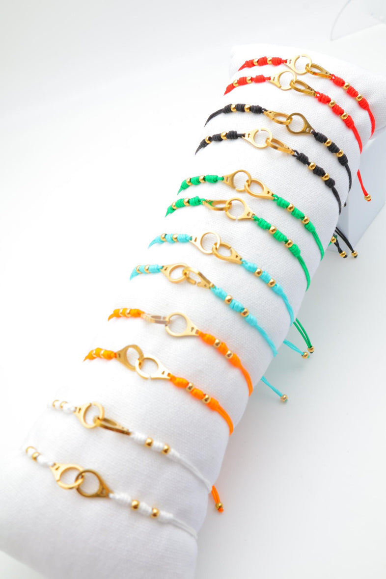 Lot de 12 bracelets en acier inoxydable avec coussin - MULTICOLORE