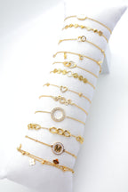 Lot de 12 bracelets en acier inoxydable avec coussin - DORÉ