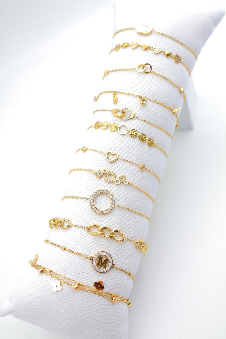 Lot de 12 bracelets en acier inoxydable avec coussin - DORÉ