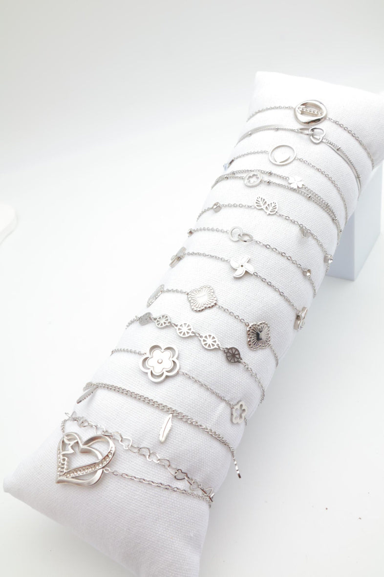 Lot de 12 bracelets en acier inoxydable avec coussin - ARGENT