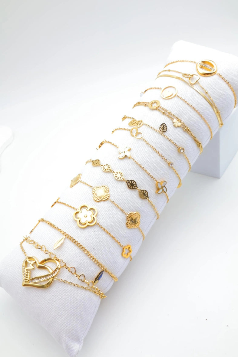 Lot de 12 bracelets en acier inoxydable avec coussin - DORÉ