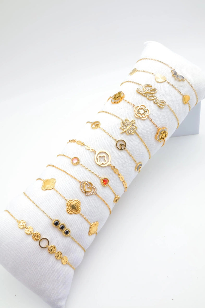 Lot de 12 bracelets en acier inoxydable avec coussin - DORÉ