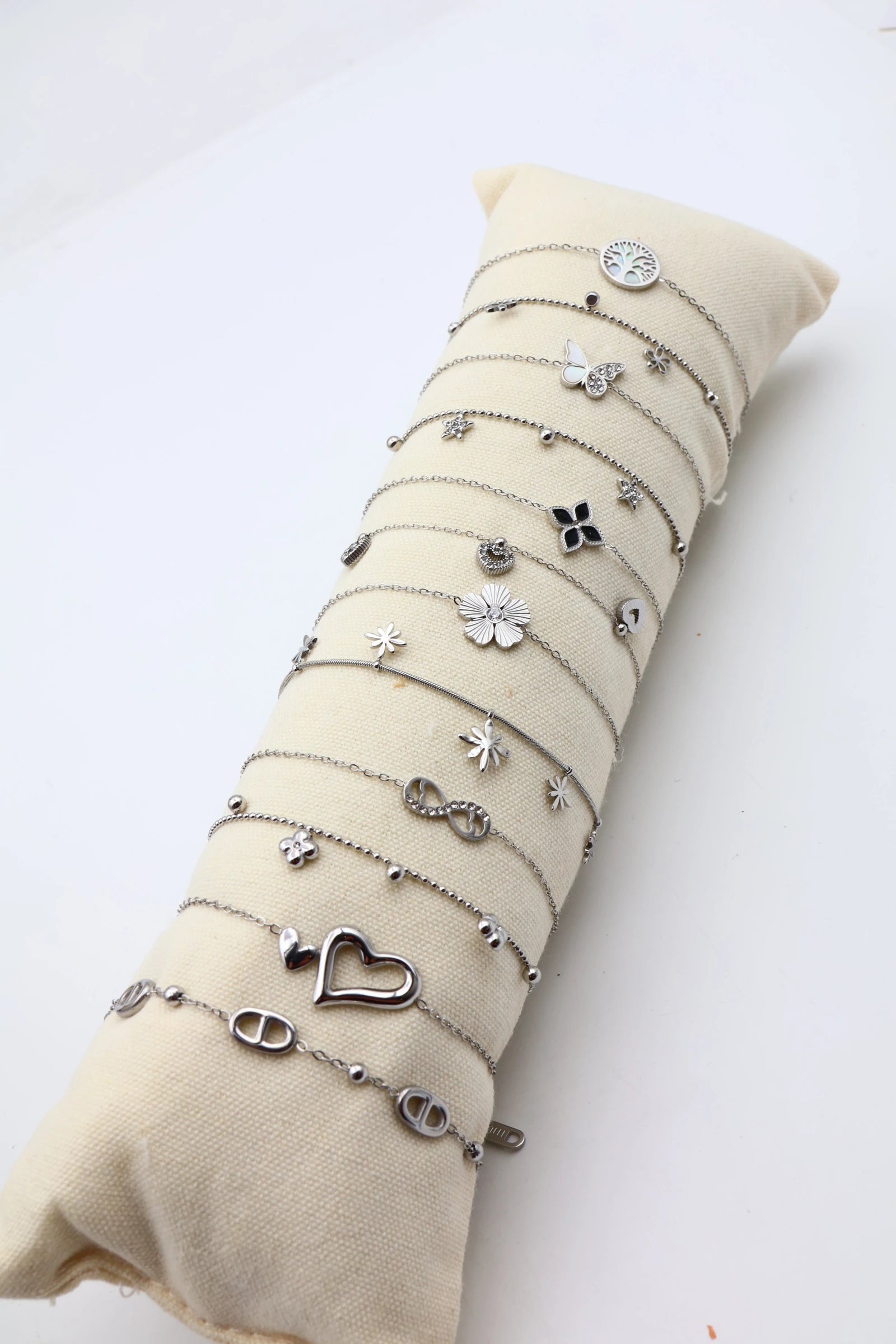Lot de 12 bracelets en acier inoxydable avec coussin - ARGENT