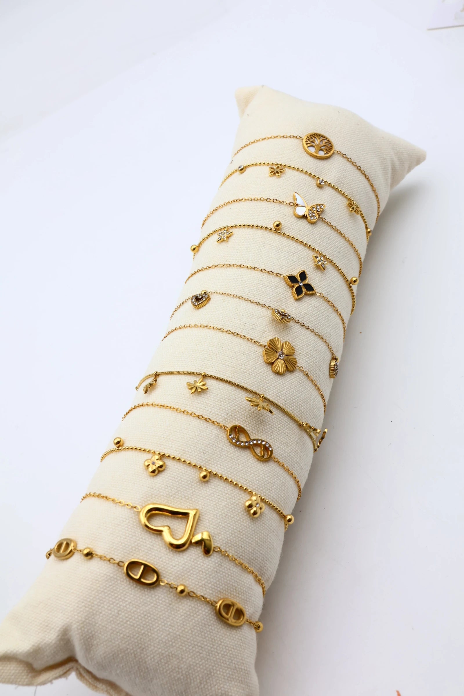 Lot de 12 bracelets en acier inoxydable avec coussin - DORÉ