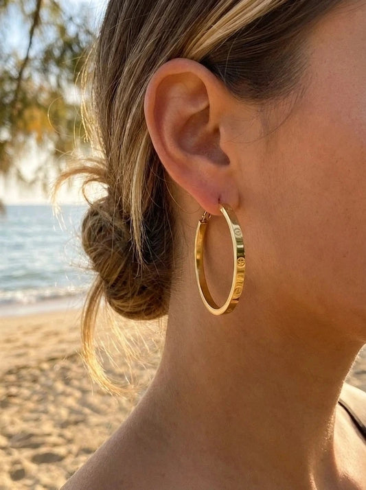Boucles d’oreilles en acier inoxydable