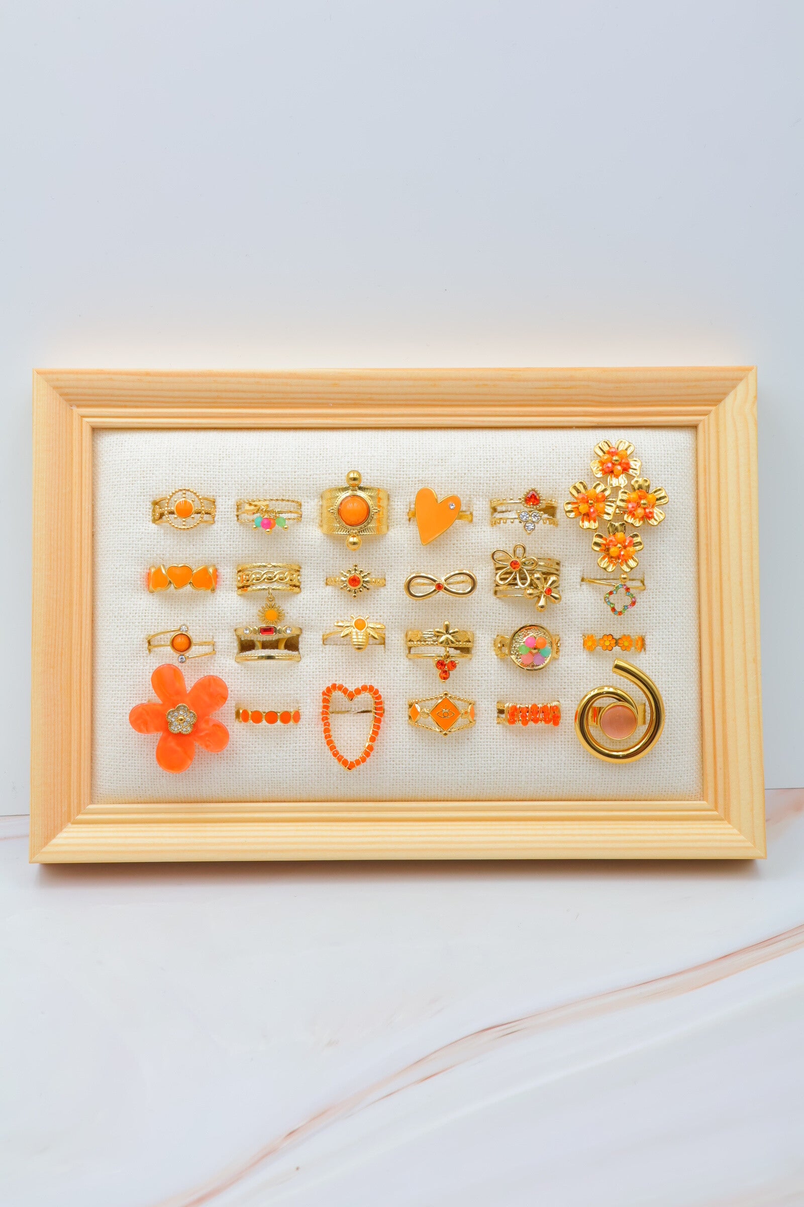 Lot de 24 bagues en acier inoxydable avec présentoir - ORANGE
