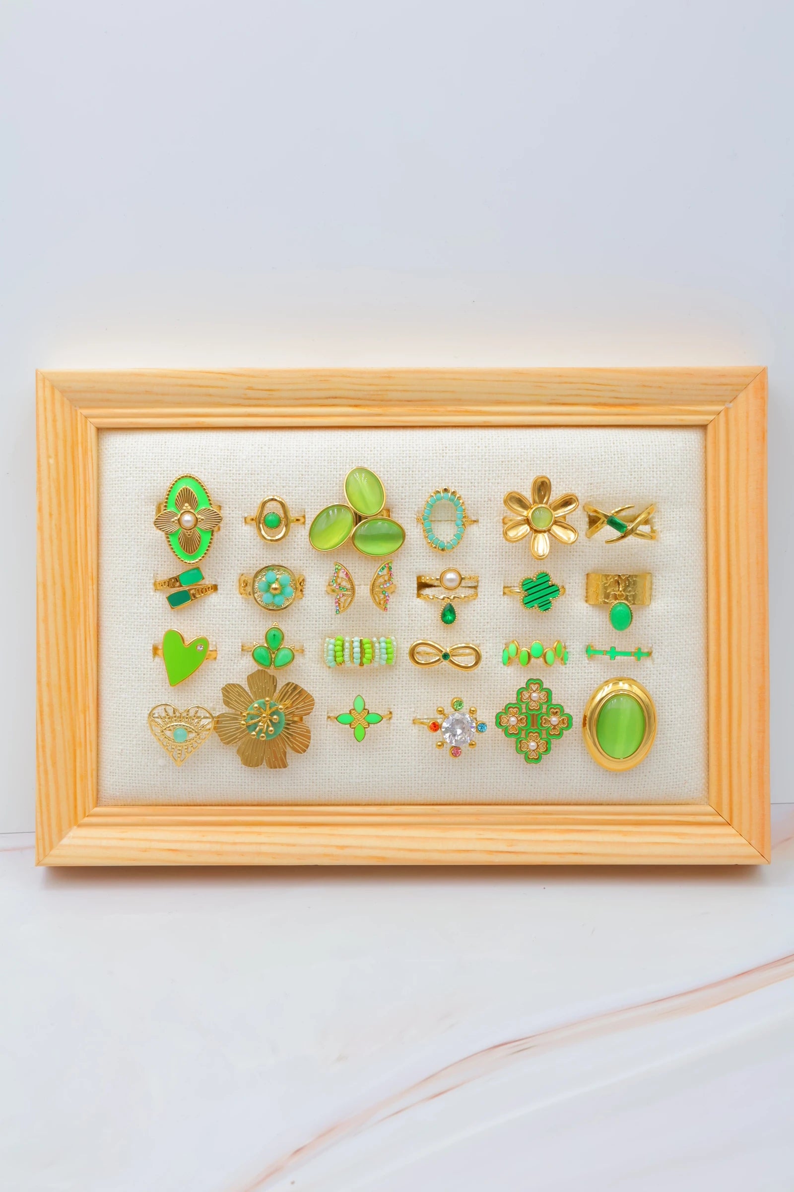 Lot de 24 bagues en acier inoxydable avec présentoir - VERT